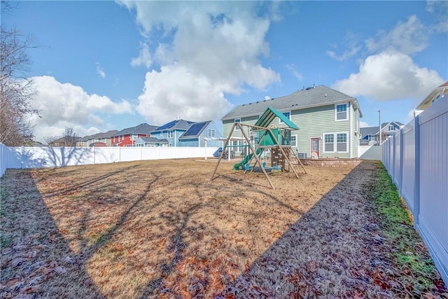 view of jungle gym featuring a fenced backyard