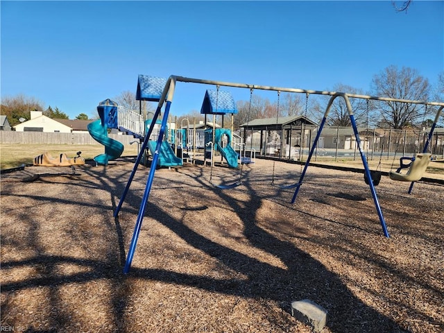 community play area featuring fence