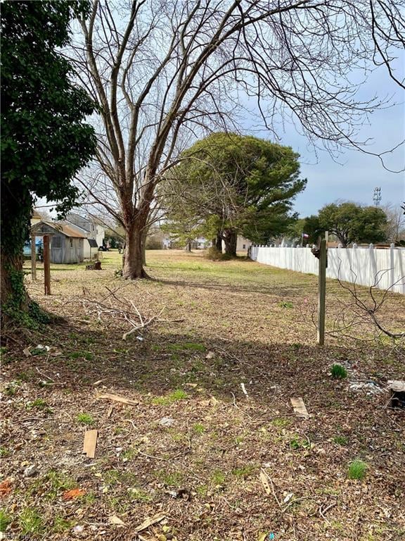 view of yard with fence