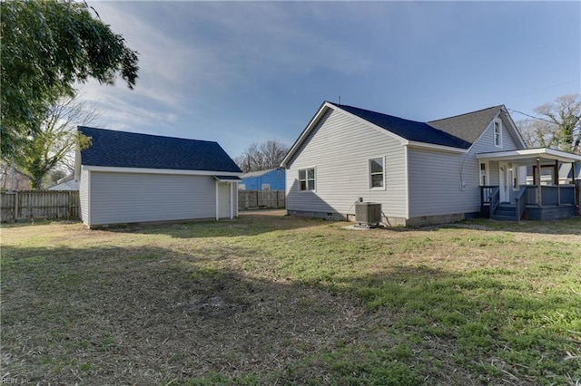 view of home's exterior featuring crawl space, covered porch, fence, and a yard