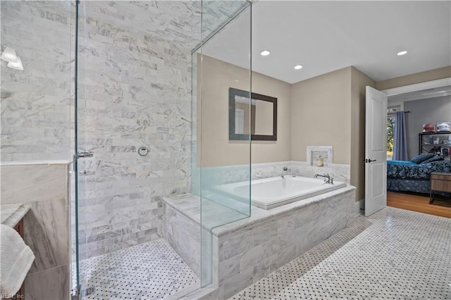 ensuite bathroom featuring a bath, tiled shower, recessed lighting, and connected bathroom