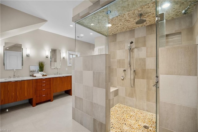 full bath featuring a sink and walk in shower