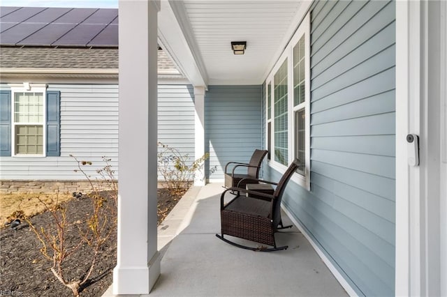 view of patio featuring a porch