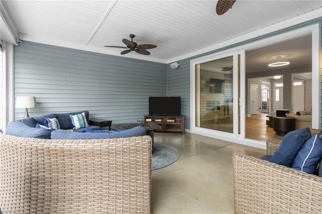 exterior space featuring ceiling fan and an outdoor hangout area