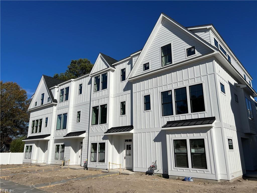 view of front of home with board and batten siding, a standing seam roof, and metal roof