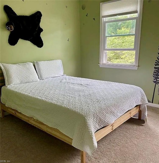 bedroom featuring carpet flooring