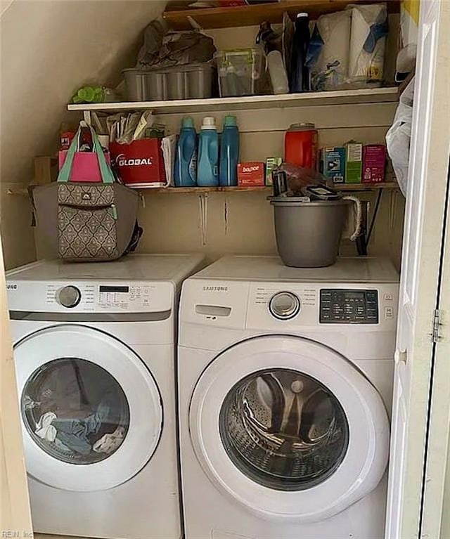 laundry area featuring washer and dryer and laundry area