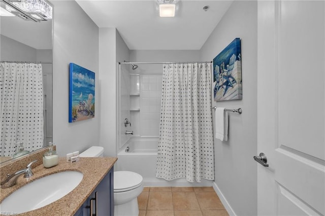 bathroom featuring tile patterned flooring, toilet, vanity, baseboards, and shower / bath combo with shower curtain