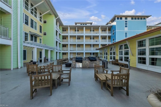 view of patio with outdoor dining area and area for grilling