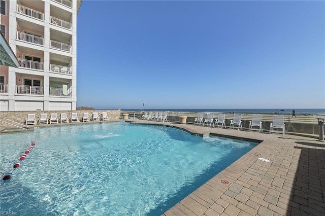 community pool featuring a patio