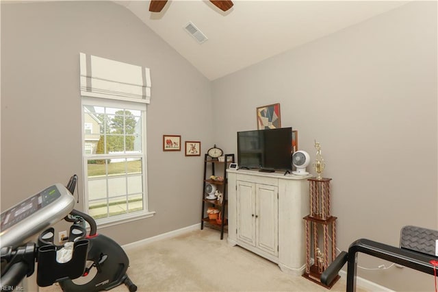 exercise area with visible vents, baseboards, lofted ceiling, ceiling fan, and light carpet