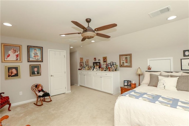 bedroom with recessed lighting, visible vents, light colored carpet, and baseboards