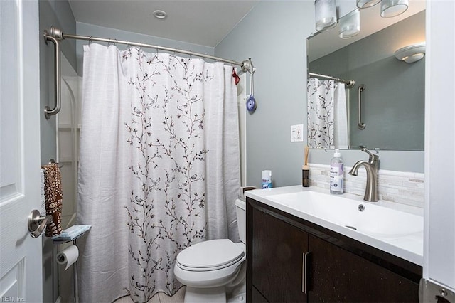 full bathroom with decorative backsplash, a shower with curtain, vanity, and toilet