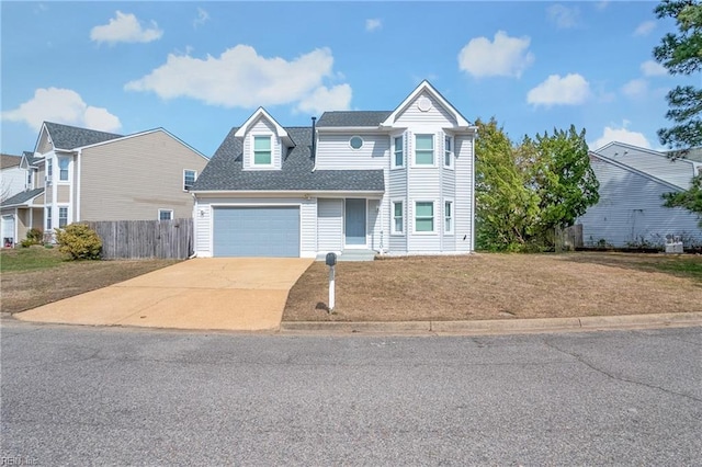 view of front of house with a garage, a shingled roof, concrete driveway, fence, and a front lawn