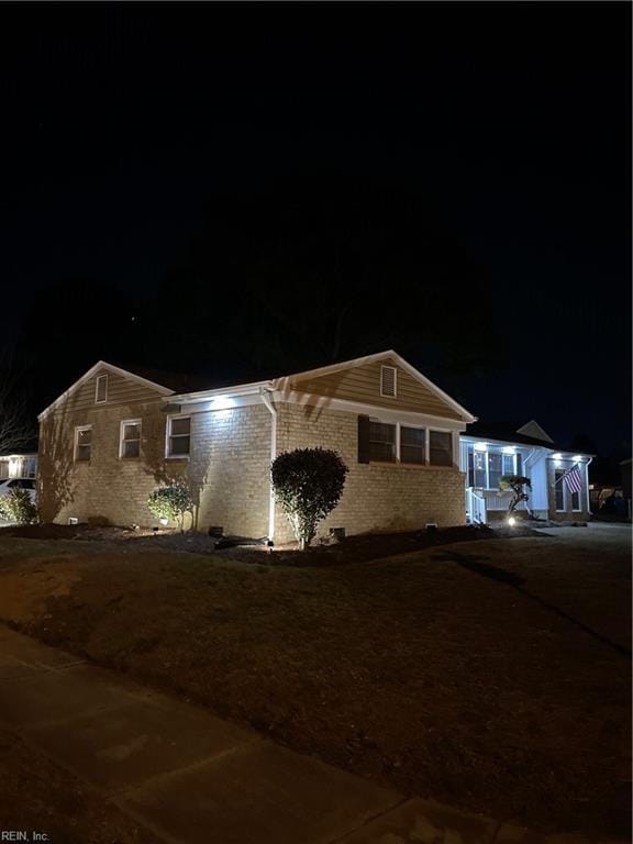 view of front of property with brick siding