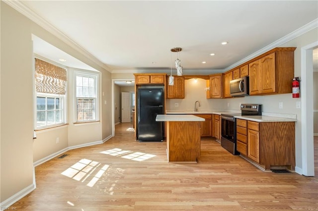 kitchen with stainless steel appliances, brown cabinets, light countertops, and a kitchen island