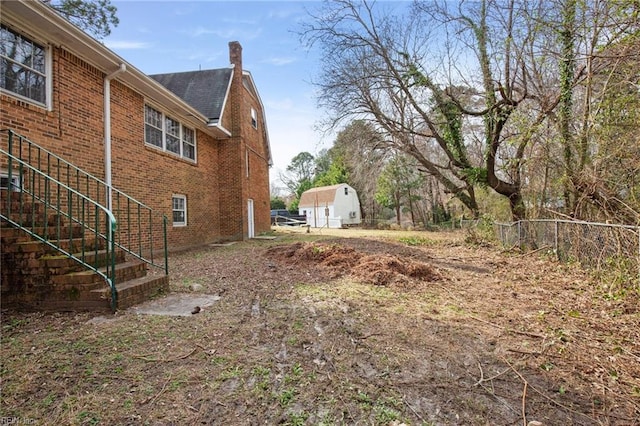 view of yard featuring fence