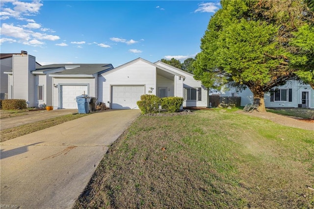 view of front of property with a garage, driveway, and a front yard