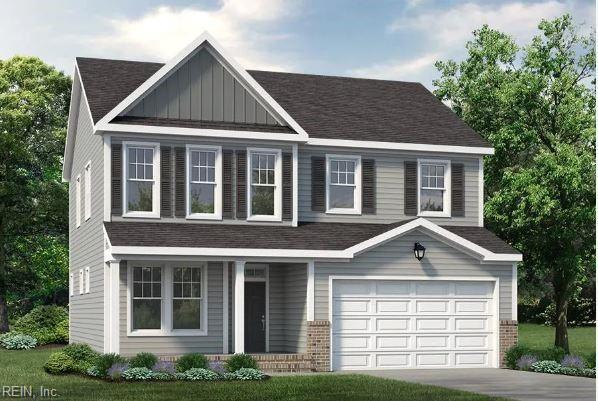 view of front of house featuring an attached garage, driveway, board and batten siding, and brick siding