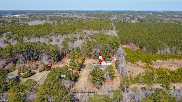 bird's eye view featuring a view of trees