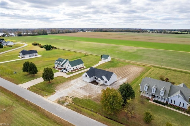 birds eye view of property featuring a rural view