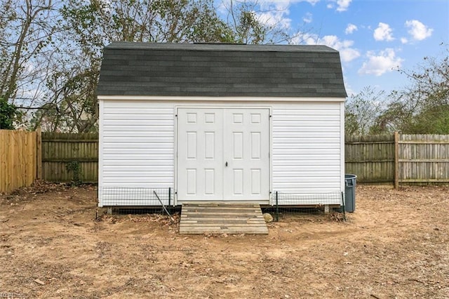 view of shed featuring a fenced backyard