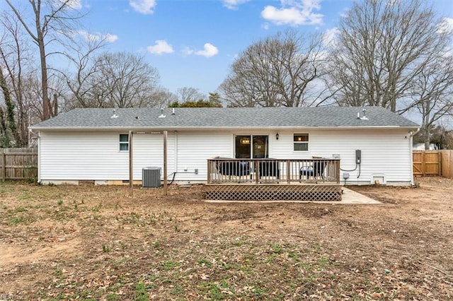 rear view of house featuring a fenced backyard, central air condition unit, roof with shingles, crawl space, and a wooden deck