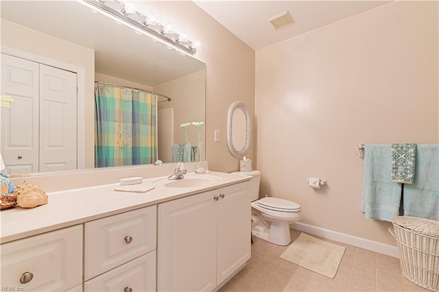 full bathroom featuring visible vents, toilet, vanity, baseboards, and tile patterned floors