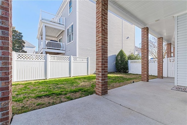 view of patio / terrace featuring fence