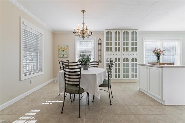 dining area featuring ornamental molding and plenty of natural light