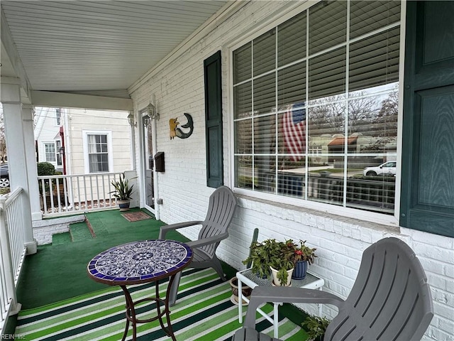 exterior space featuring covered porch