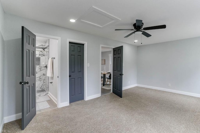 unfurnished bedroom with carpet, recessed lighting, attic access, ensuite bath, and baseboards