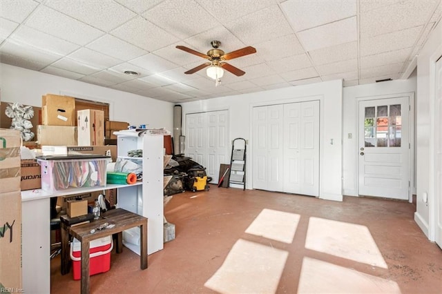 storage room featuring a ceiling fan and visible vents