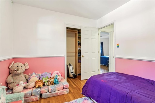 bedroom featuring wood finished floors