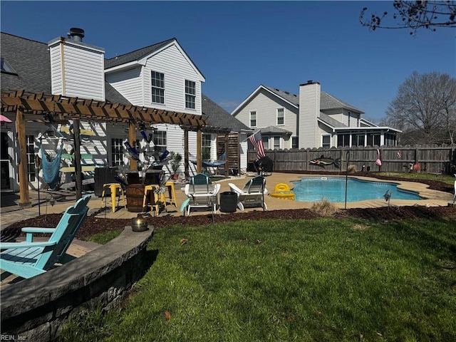 view of pool featuring a lawn, a fenced in pool, fence, a patio area, and a pergola