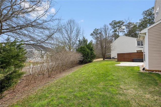 view of yard with a patio and fence