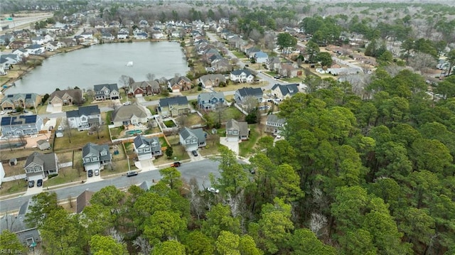 aerial view with a water view and a residential view