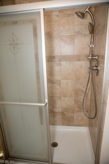 full bath featuring a stall shower