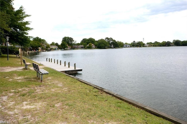 dock area with a water view