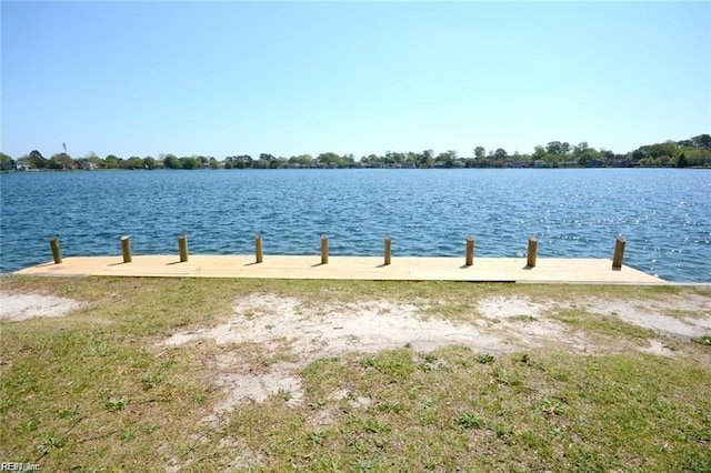 property view of water with a dock