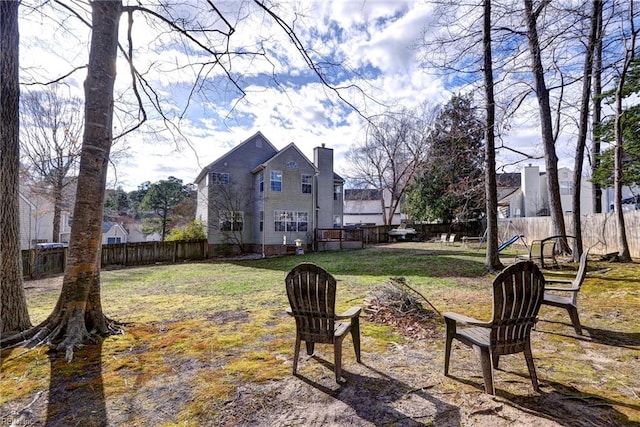 view of yard with a fenced backyard