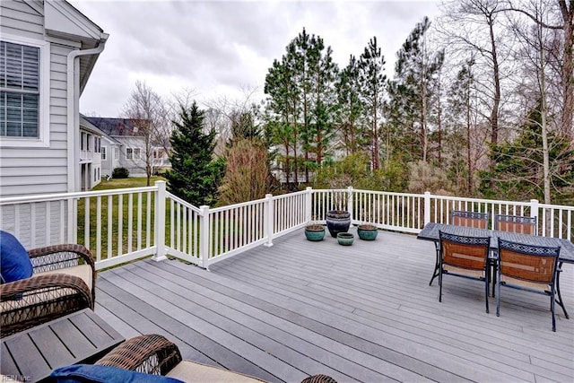 deck with outdoor dining space