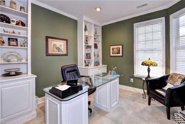 office space with baseboards, visible vents, light colored carpet, and ornamental molding