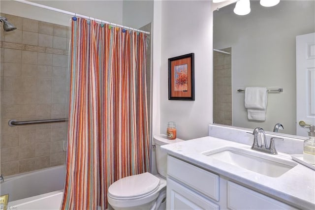 bathroom featuring shower / bath combo, vanity, and toilet