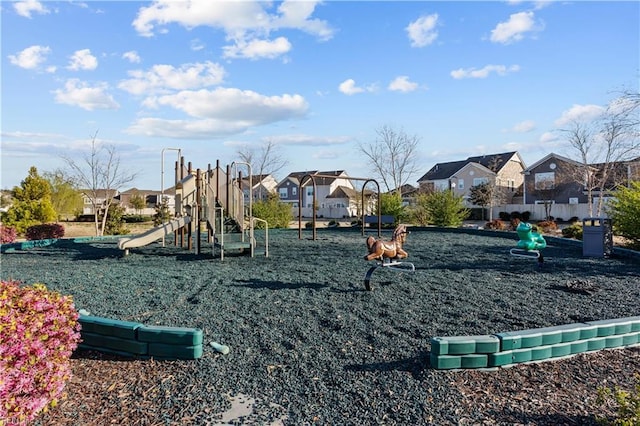 community playground featuring a residential view