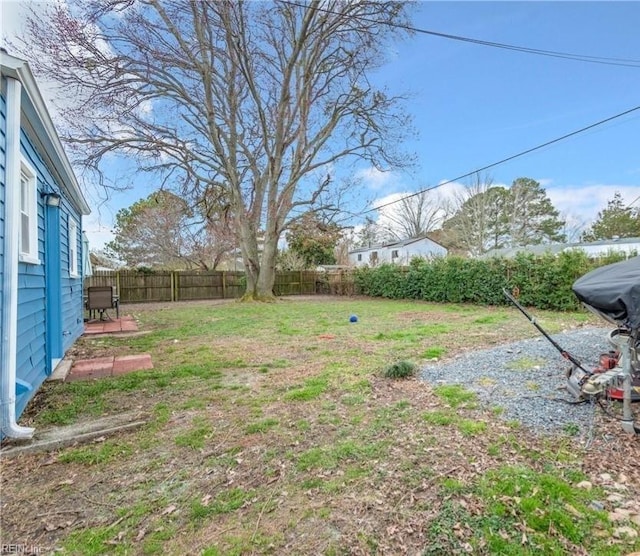 view of yard featuring a fenced backyard