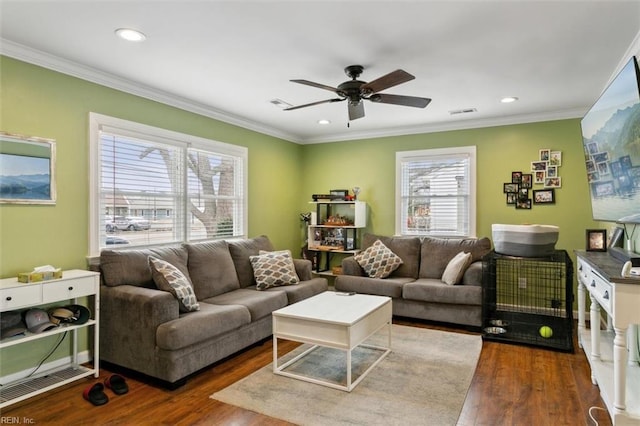 living room featuring dark wood-style floors, recessed lighting, and crown molding