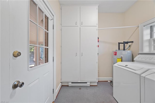 laundry area with cabinet space, baseboards, a baseboard radiator, washing machine and clothes dryer, and carpet