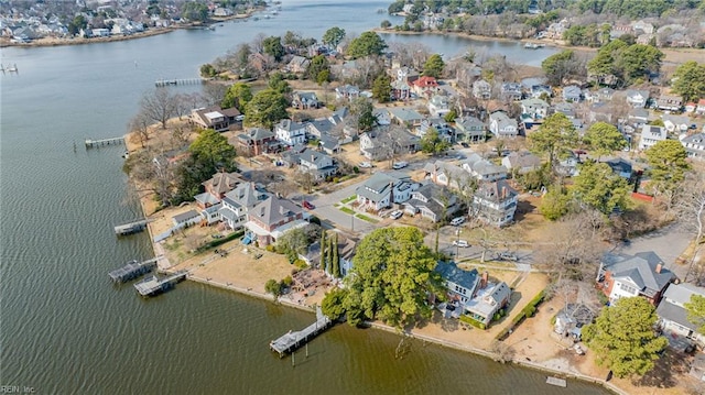 aerial view with a residential view and a water view