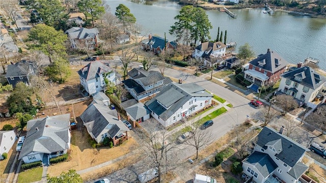 aerial view featuring a water view and a residential view